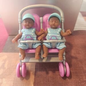 Zuru Mini Twin Baby Dolls in Pink Stroller with Blue Outfits.